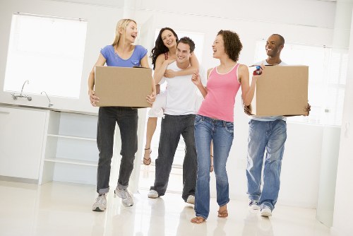 Removal van and moving team in Clerkenwell street setting