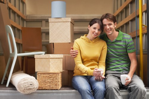 Local removals crew handling boxes and furniture near Clerkenwell