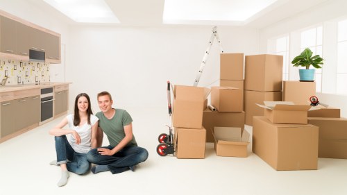 Professional movers assisting with a Clerkenwell flat move and careful unloading
