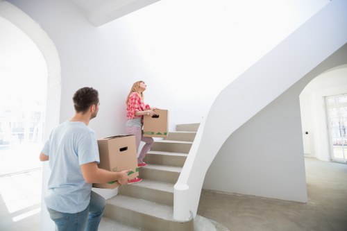 Careful moving team handling items in a central London building